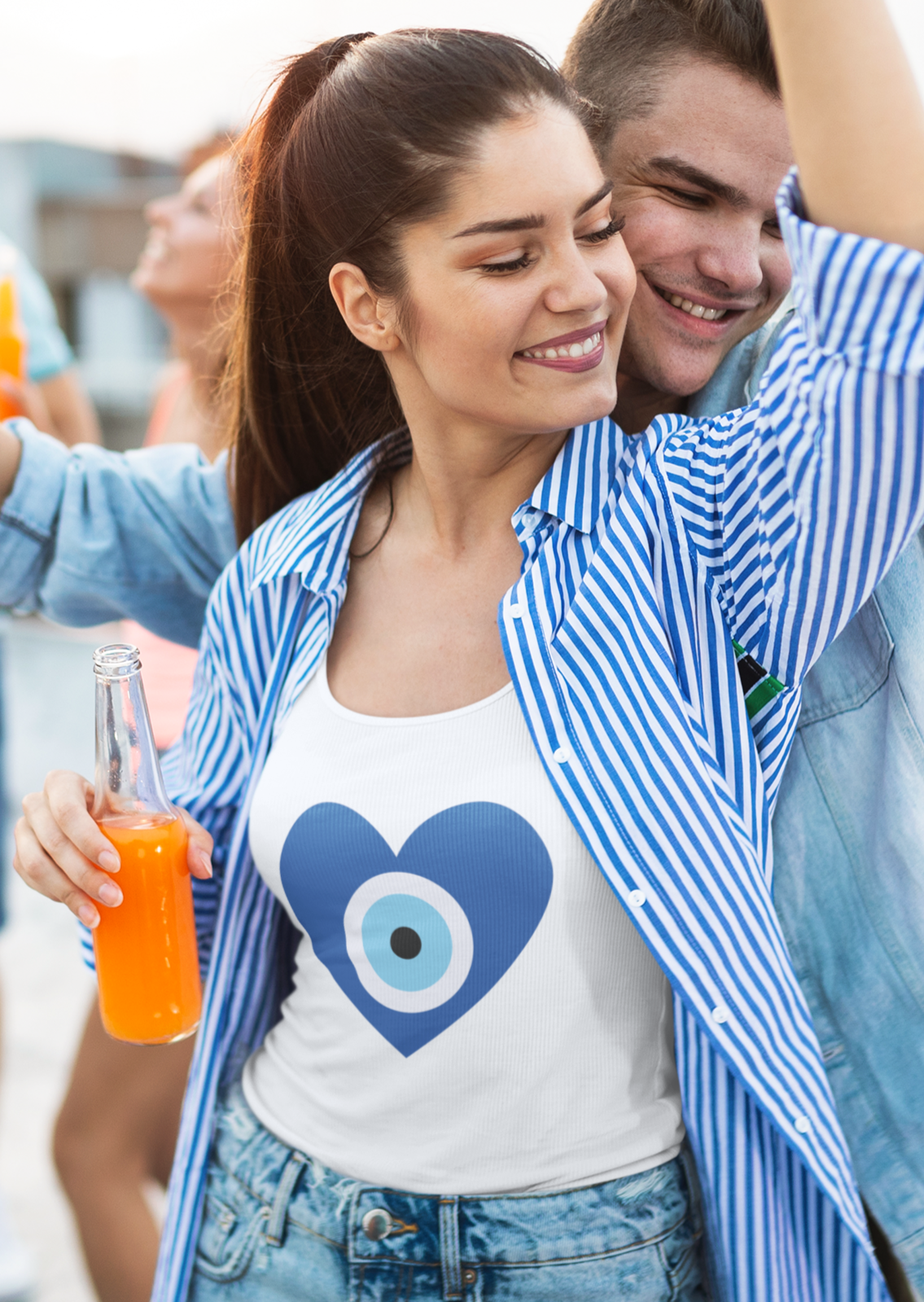Heart Evil Eye Women's Tank – woman dancing at a rooftop party