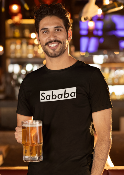 Sababa Logo B&W Men's Tee – smiling bearded man holding a beer glass in a bar