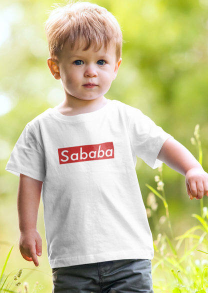 Sababa Logo Tee – toddler playing in the grass